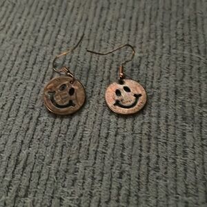 Smiley face cutout penny earrings